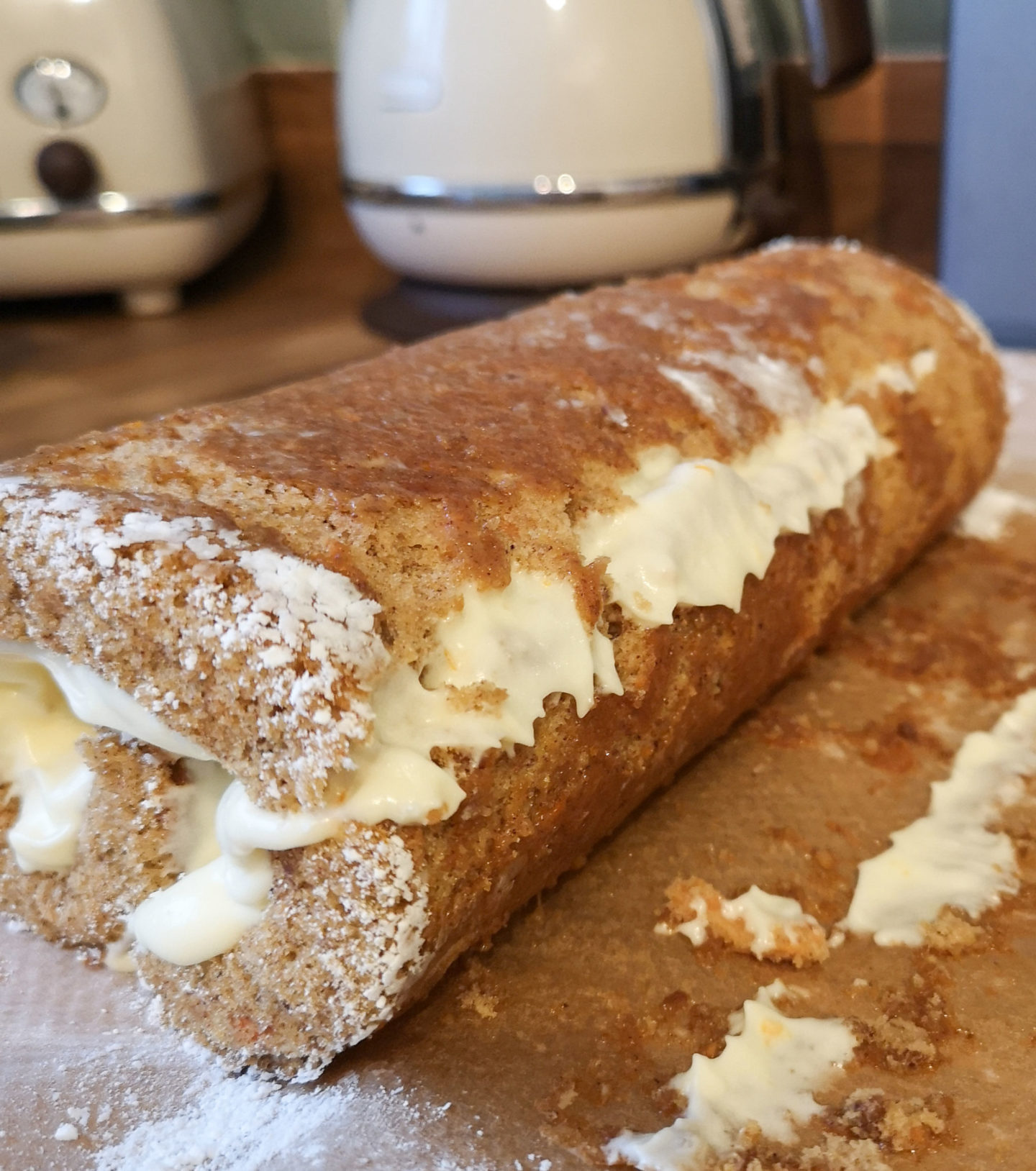 Cracked, failed attempt at carrot cake Swiss roll