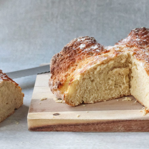 Irish soda bread with wedge cut away to see inside