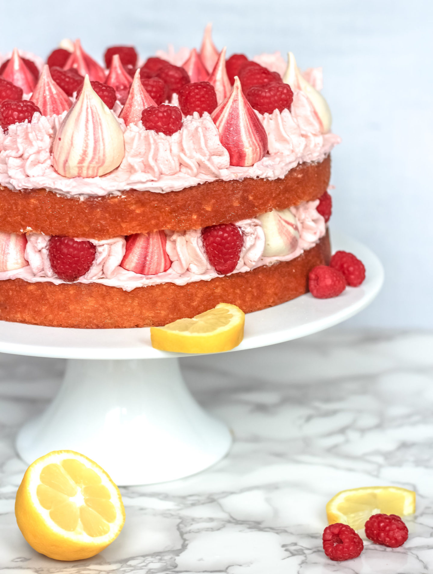 lemon raspberry cream cake with meringue kisses