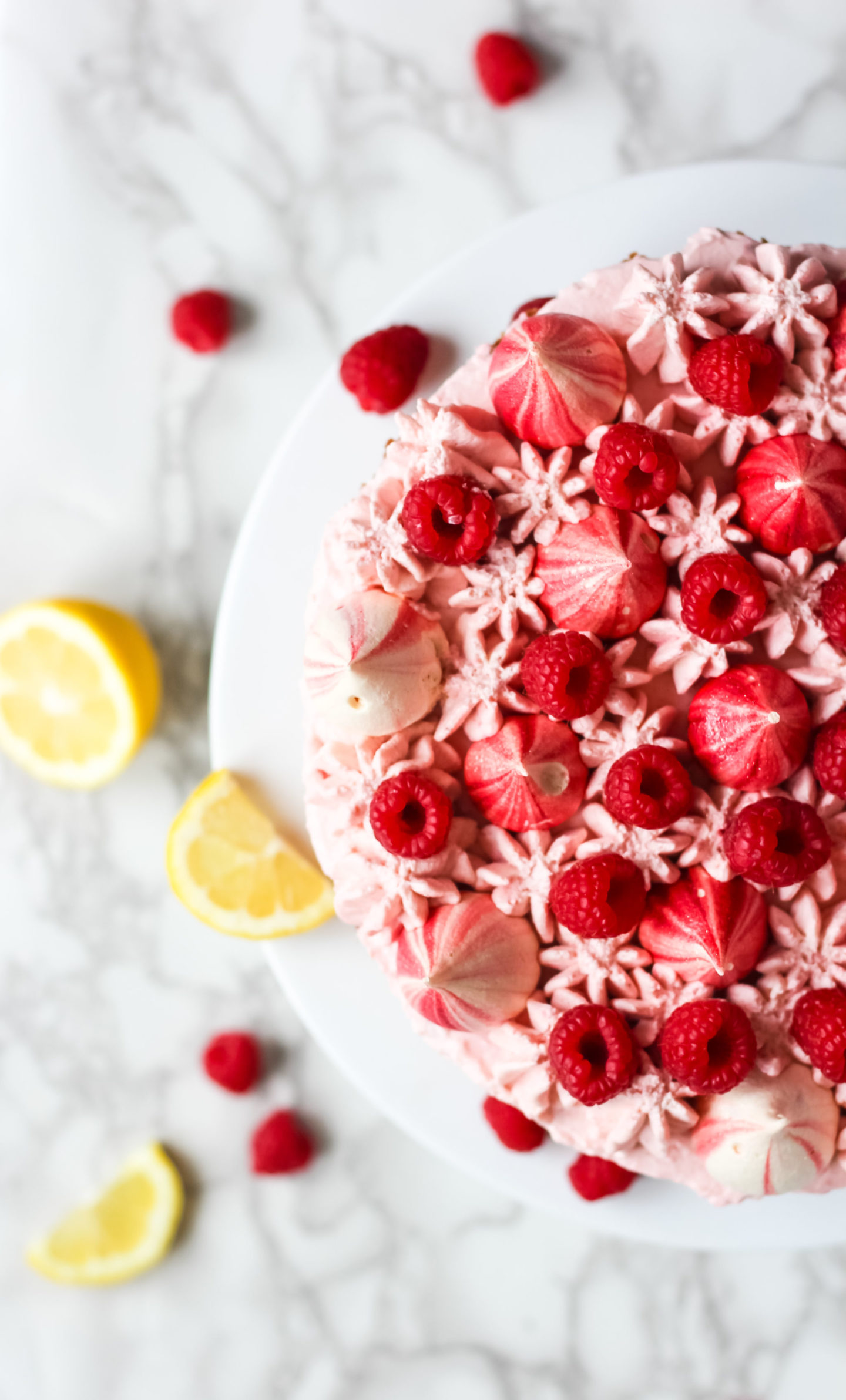 lemon raspberry cream cake with meringue kisses