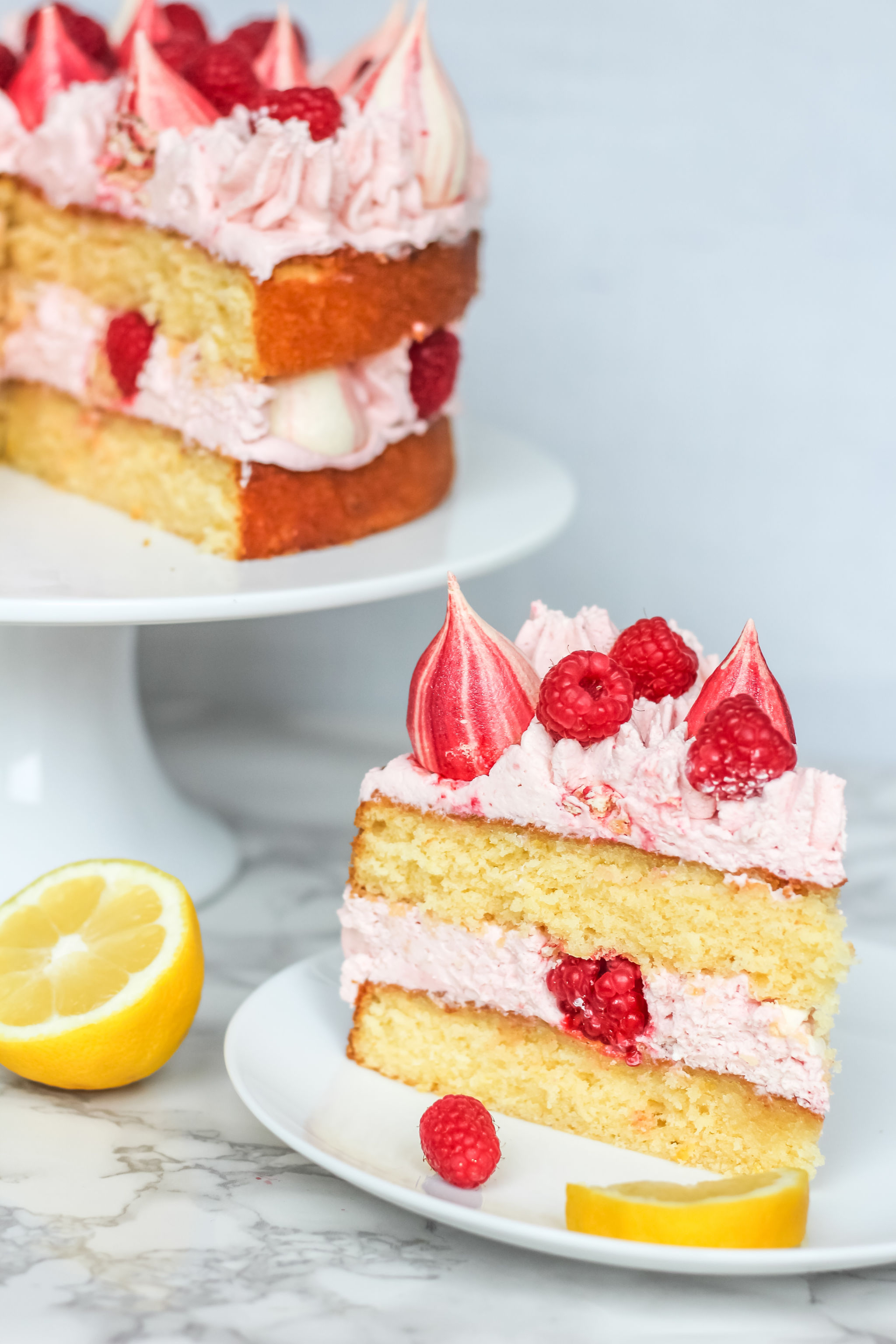 Lemon Raspberry Cream Cake with Meringue Kisses - Baker Jo