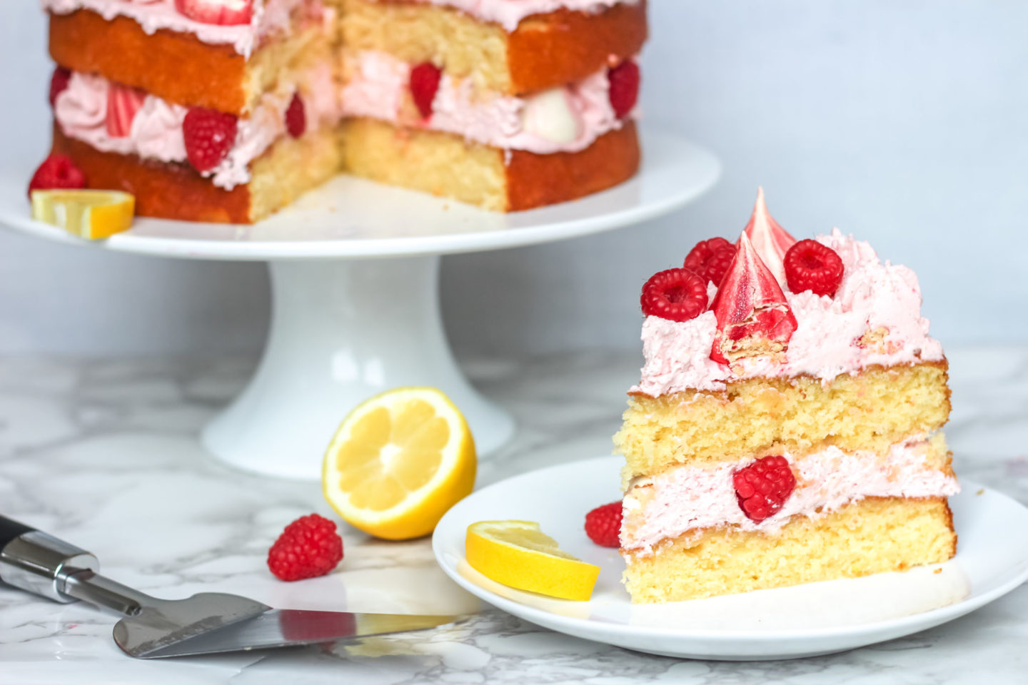 lemon raspberry cream cake with meringue kisses