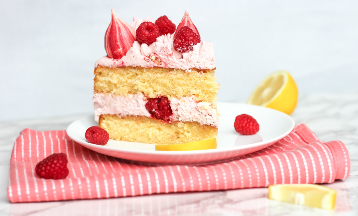 lemon raspberry cream cake with meringue kisses