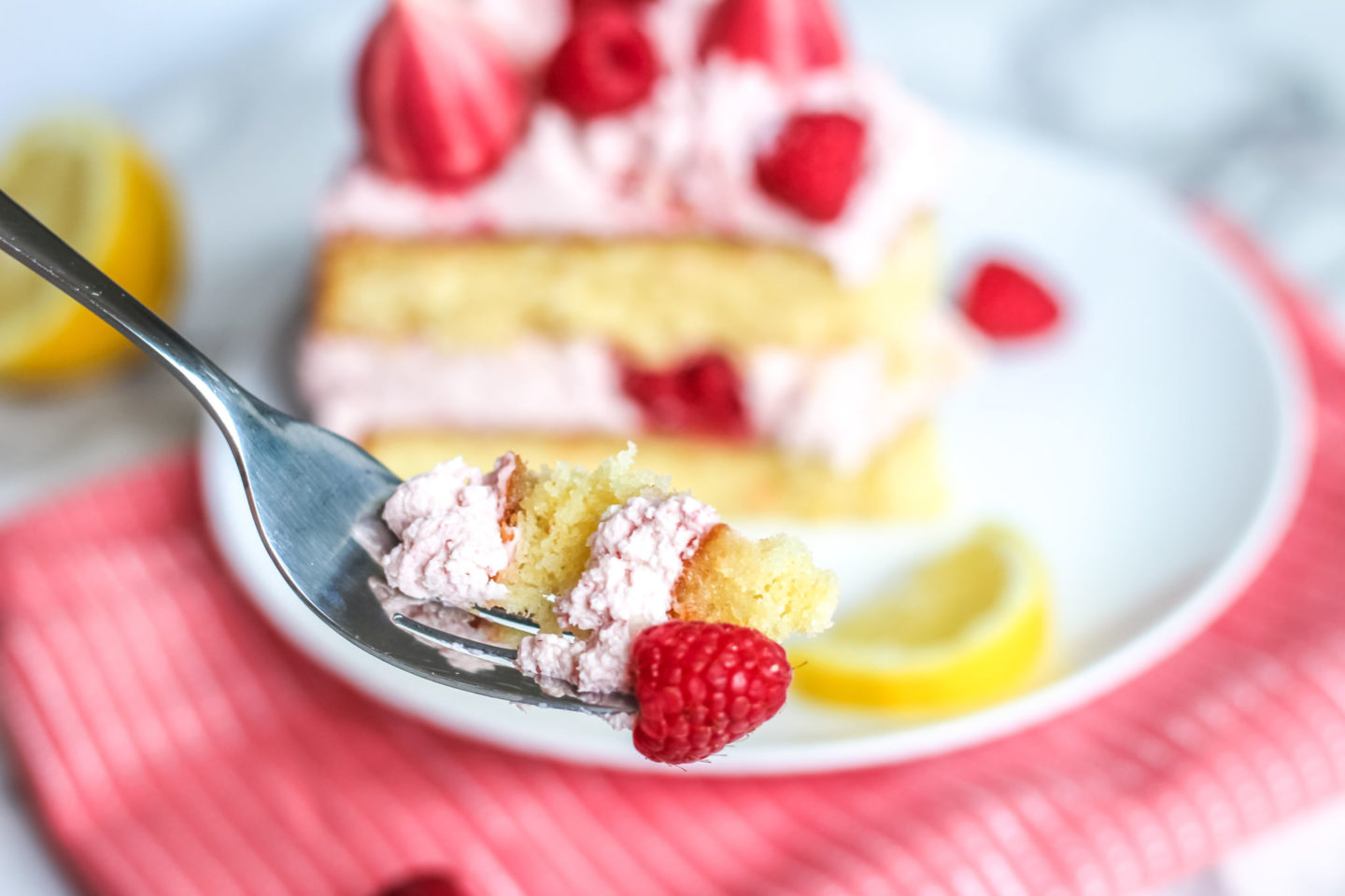 lemon raspberry cream cake with meringue kisses