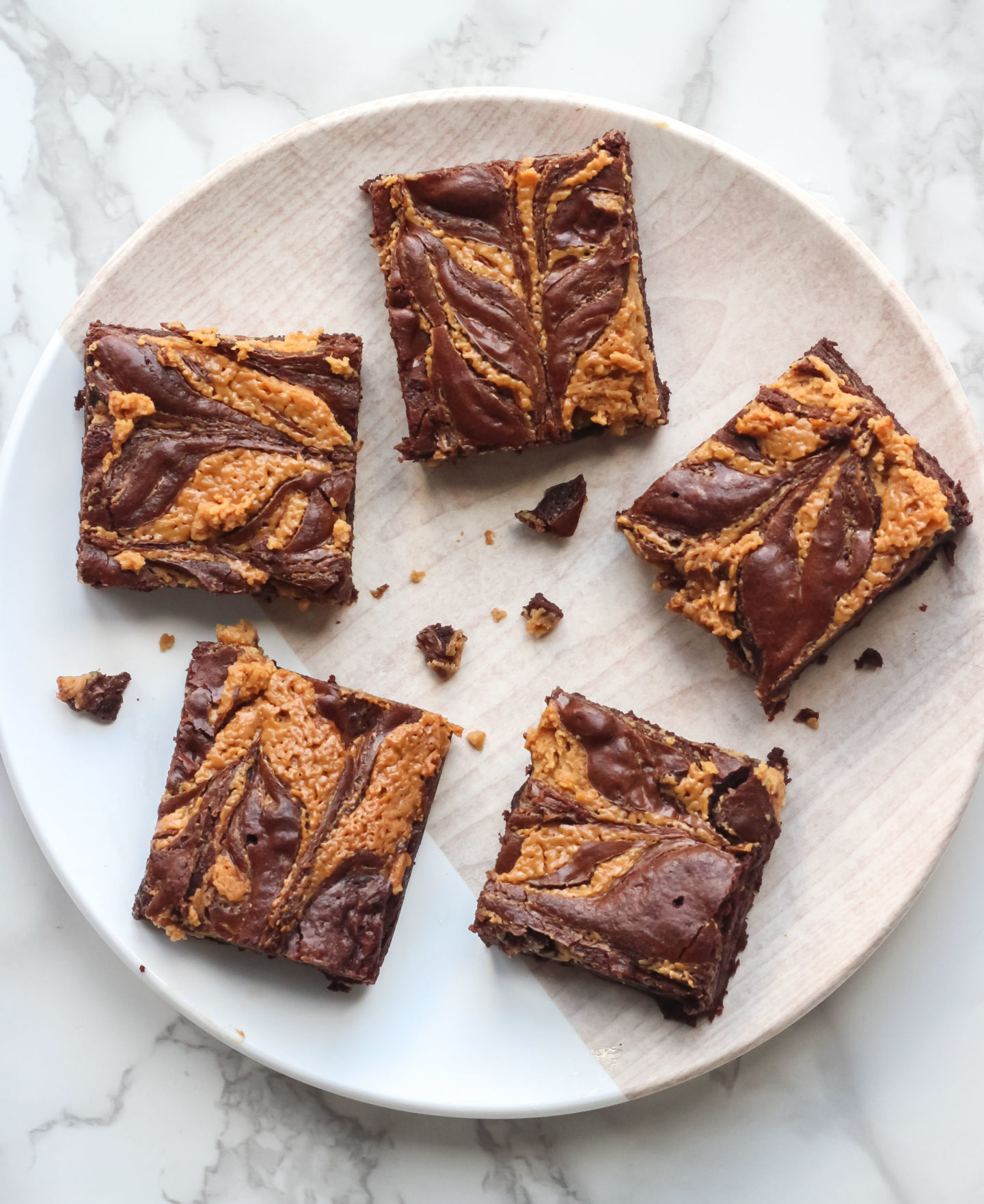 plate of brownies showing peanut butter swirl pattern