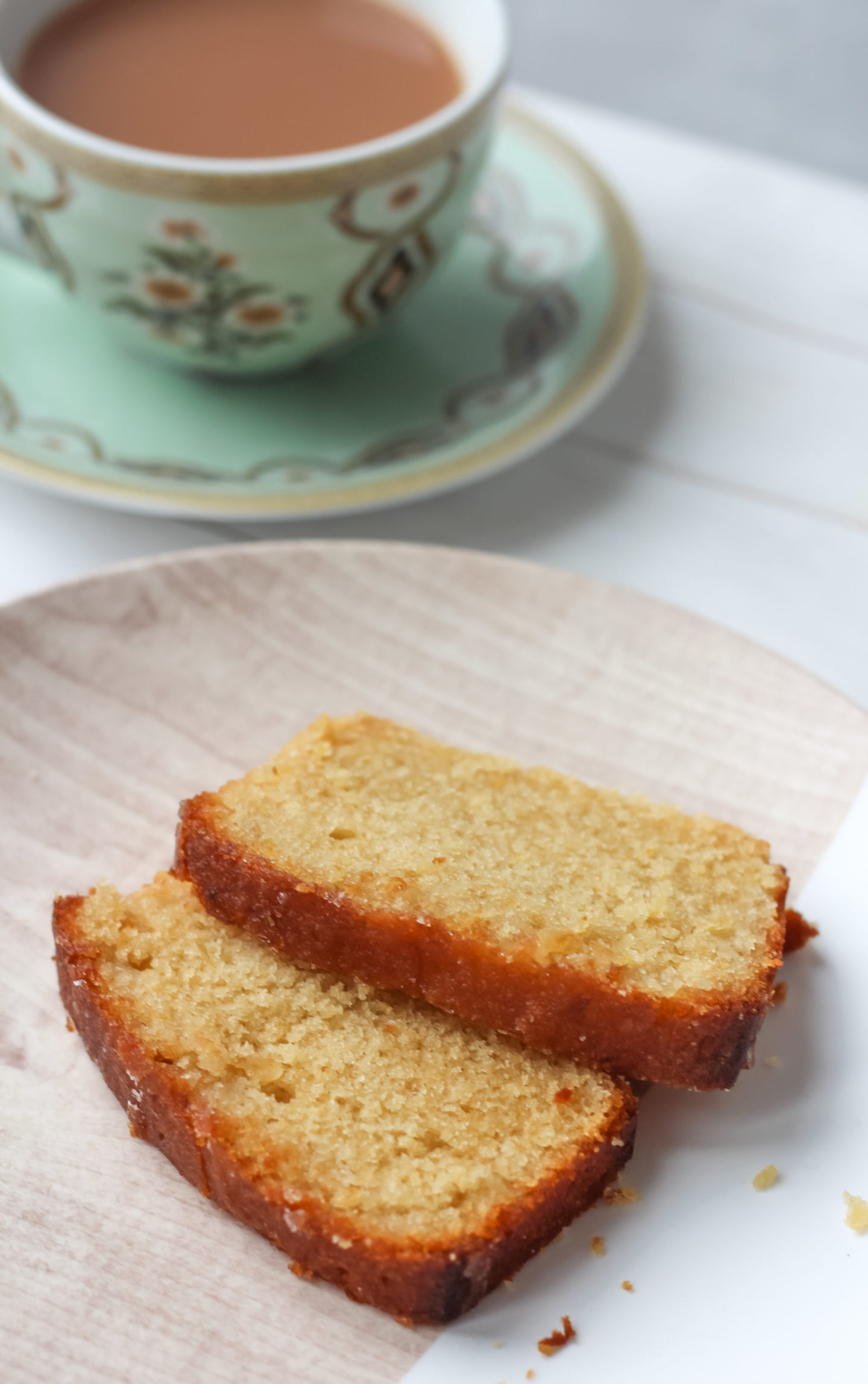 close up of cake slices with teacup in background