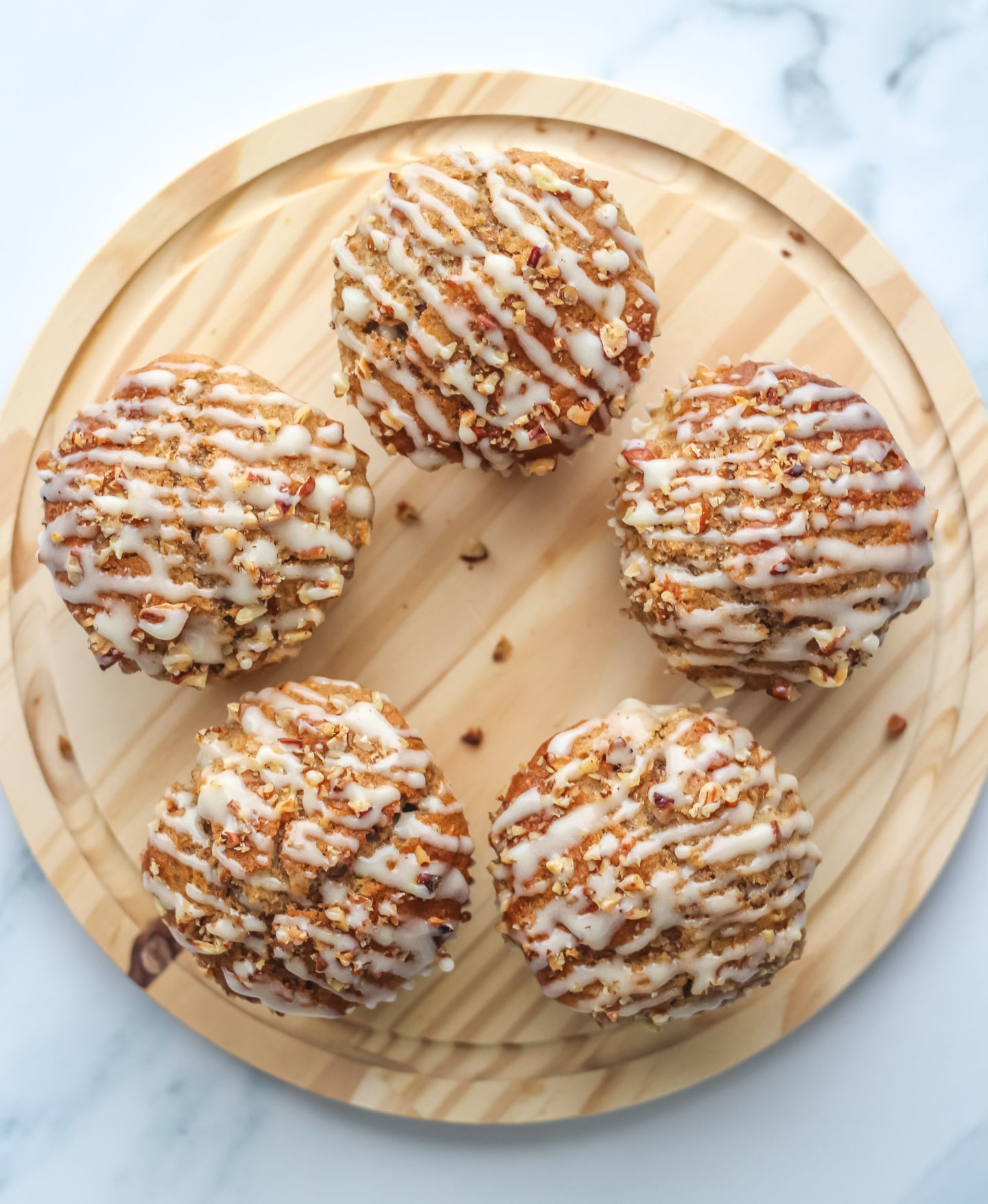 overhead shot of iced muffins