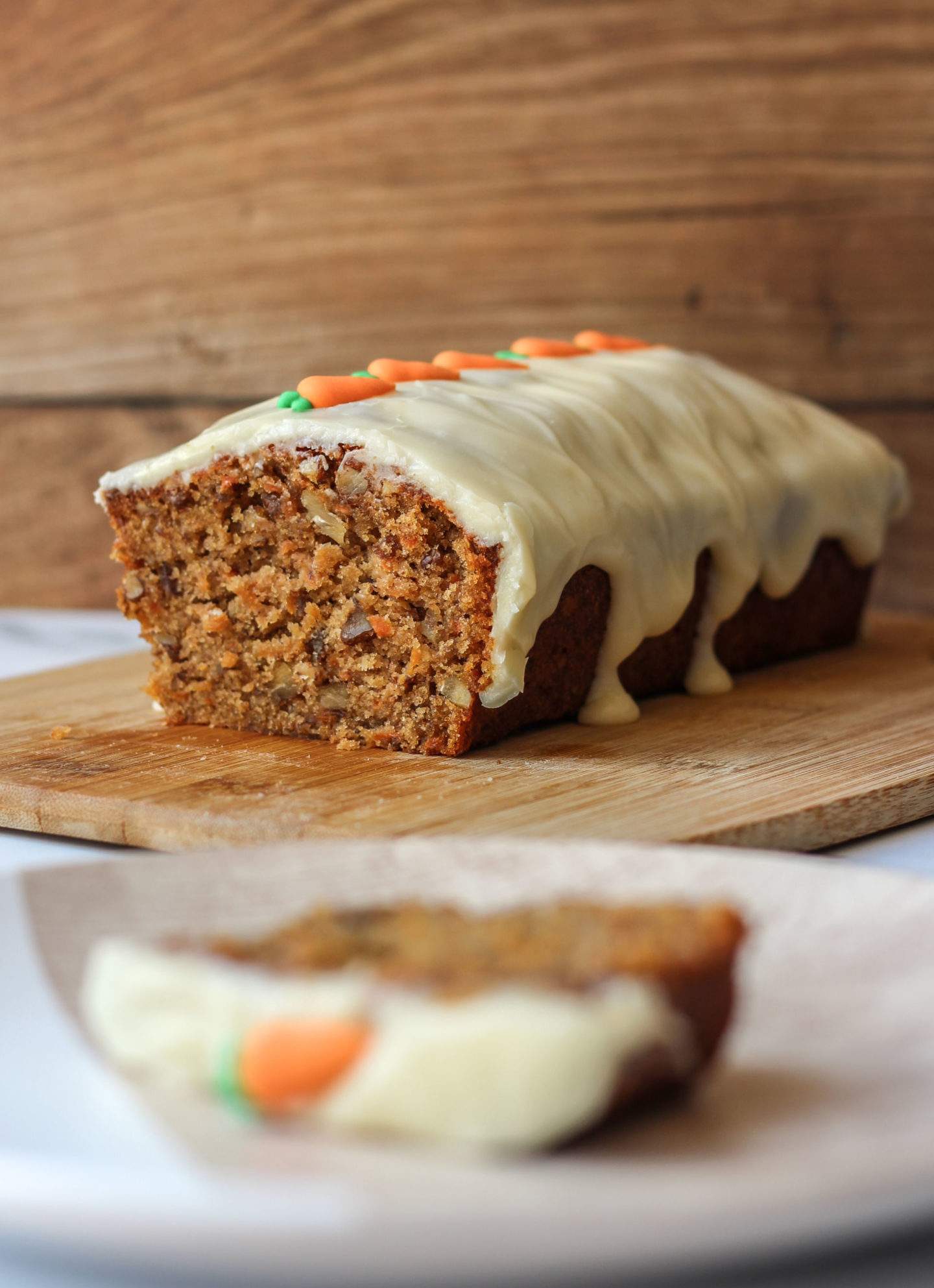 loaf cake with slice of cake on plate