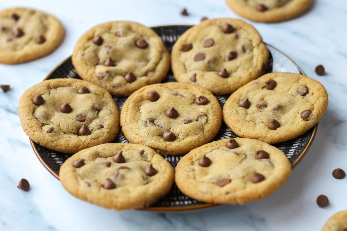 Plate of several chewy chocolate chip cookies