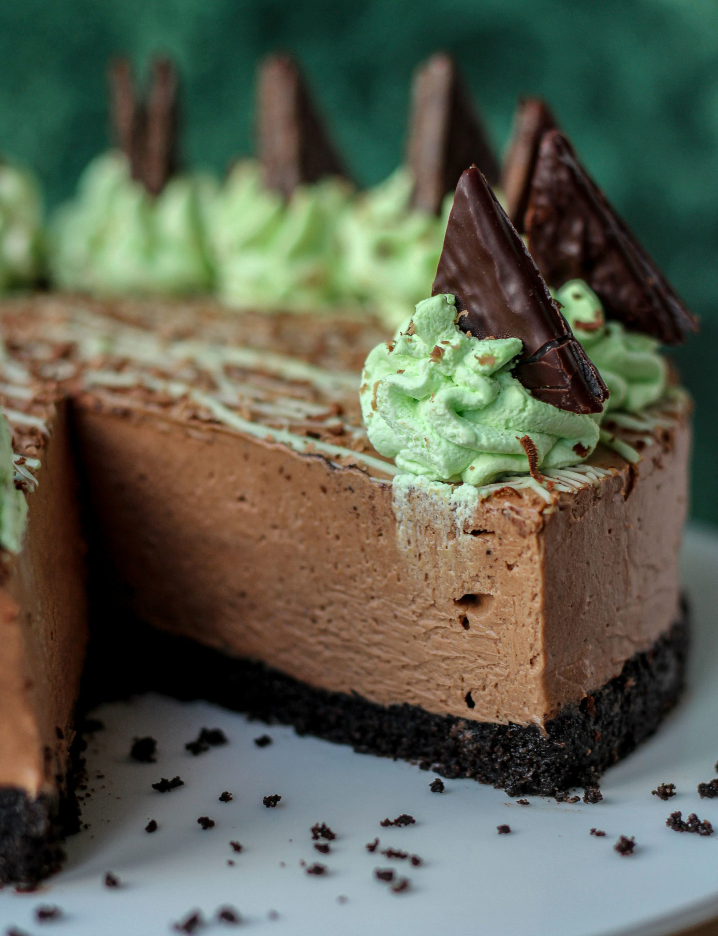 Close up showing inside of no-bake mint chocolate cheesecake