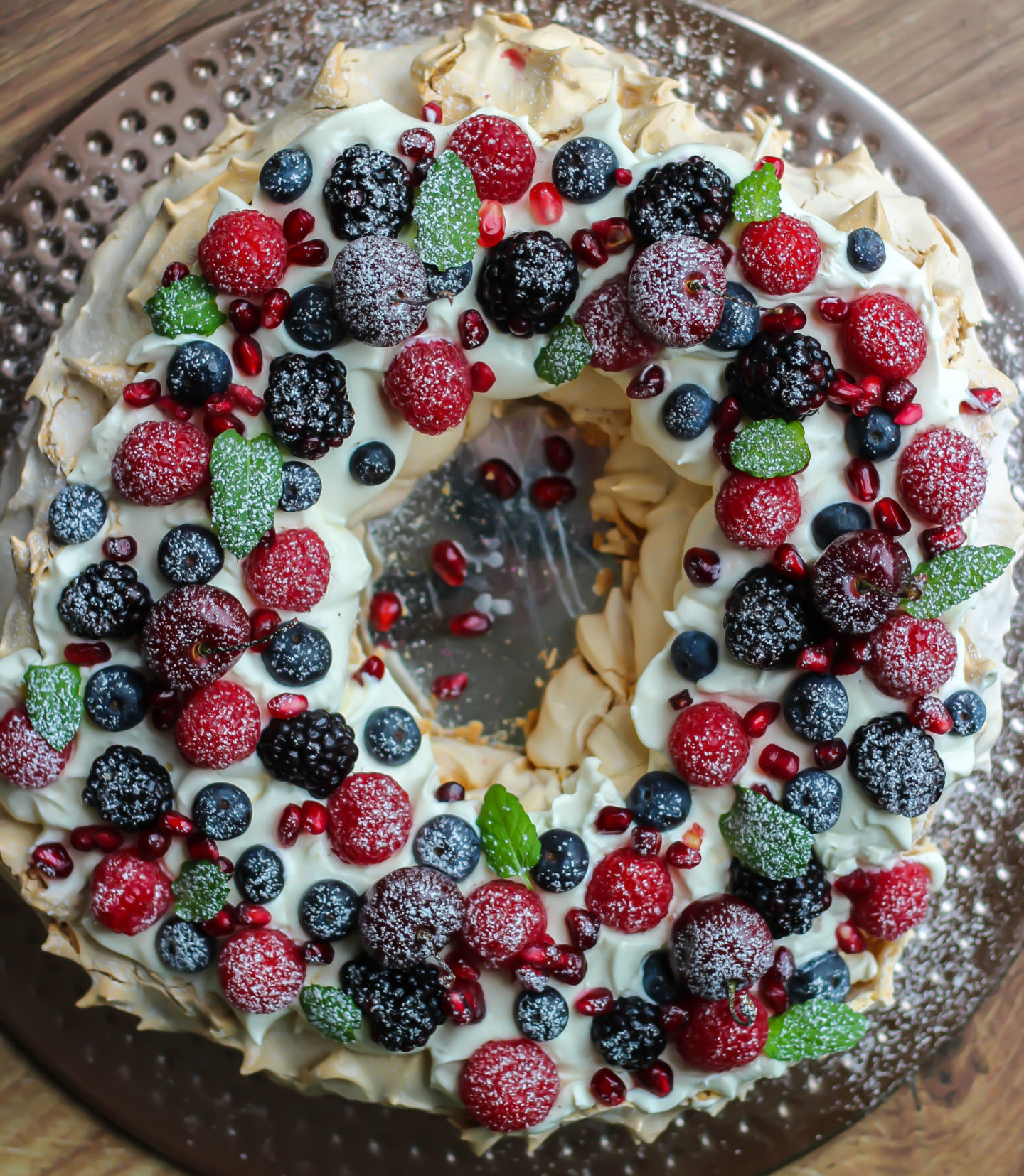 view from above of Christmas berry pavlova wreath