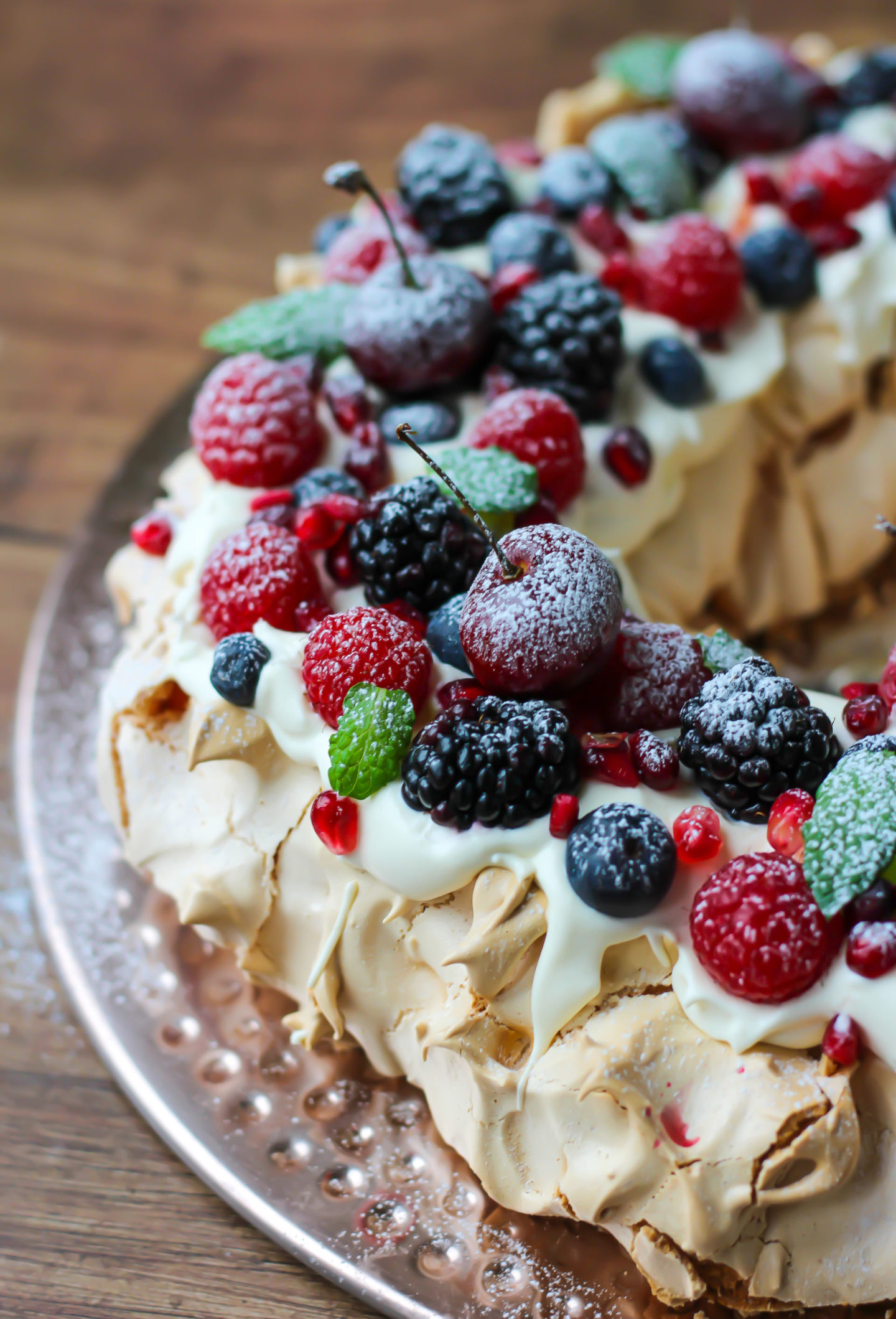 side view of Christmas berry pavlova wreath