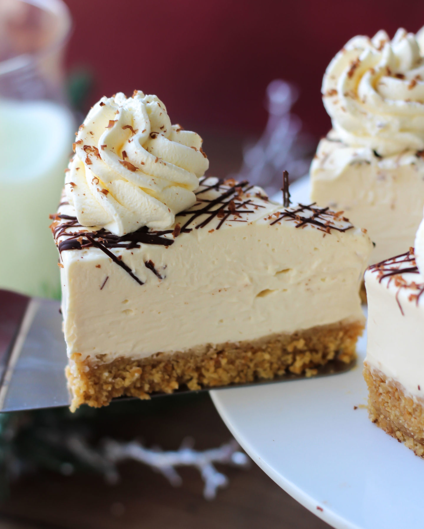 Close up of slice of no-bake Baileys cheesecake