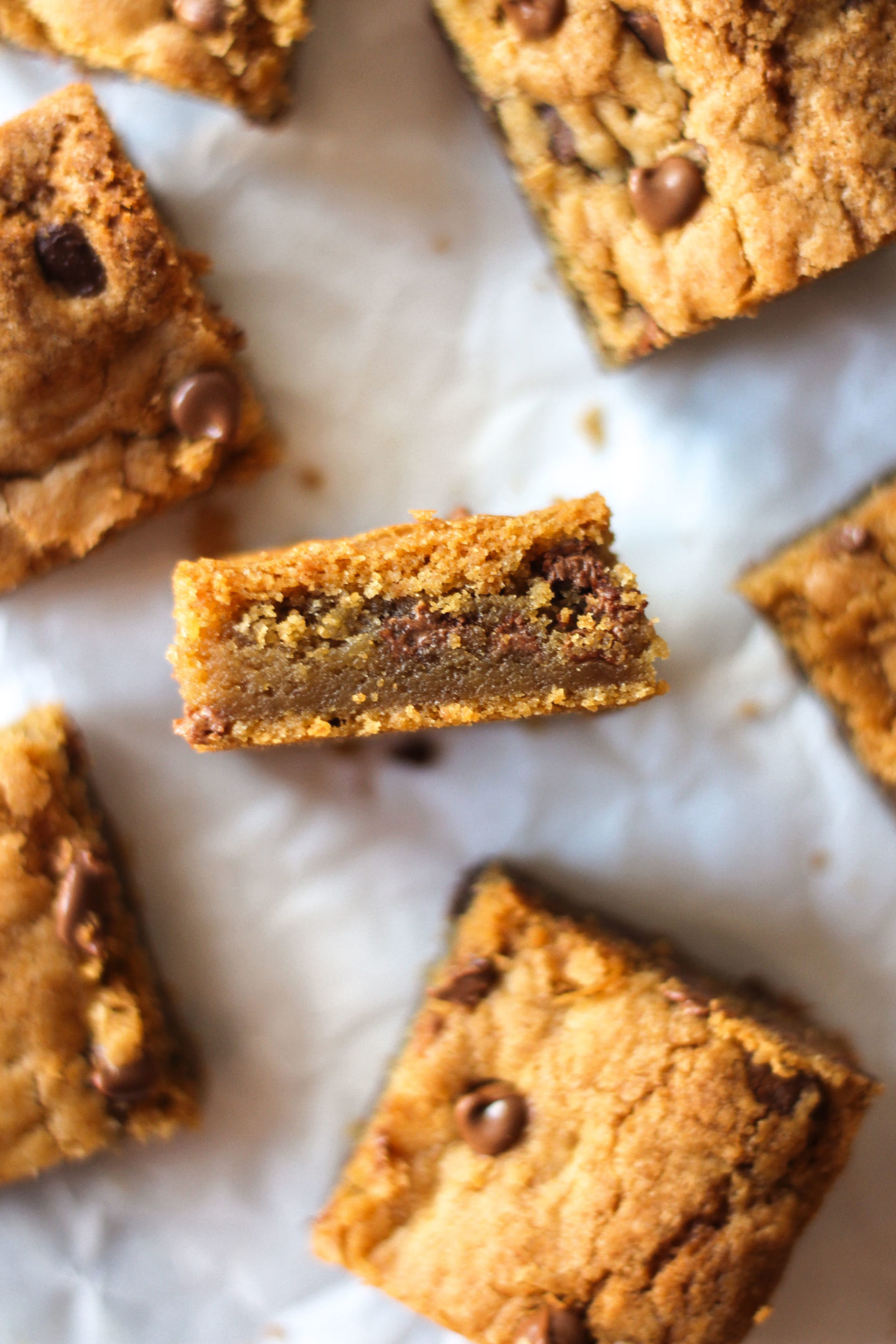 close up of inside of chewy chocolate chip cookie bar