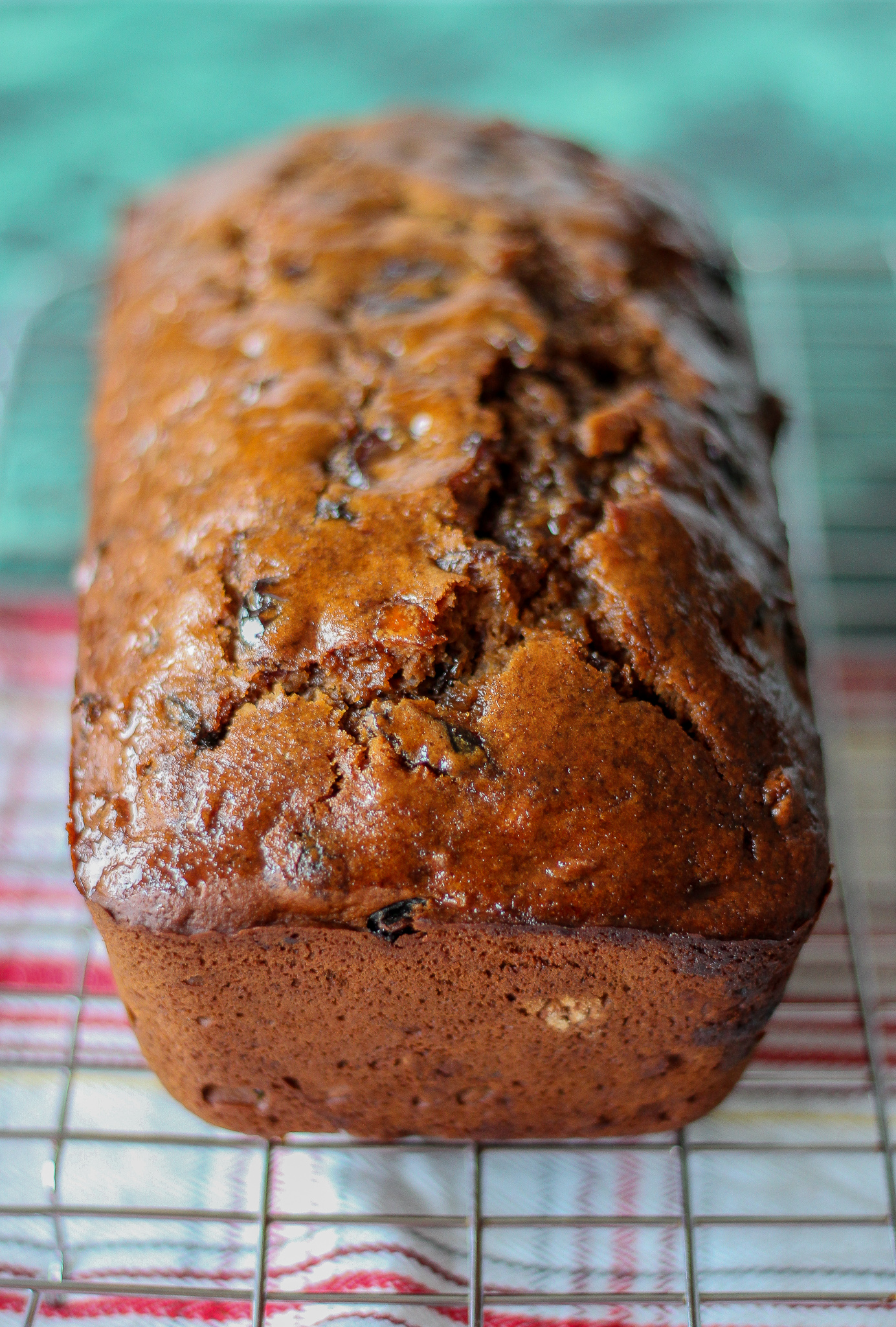 whole unsliced bara brith loaf cake on wire rack