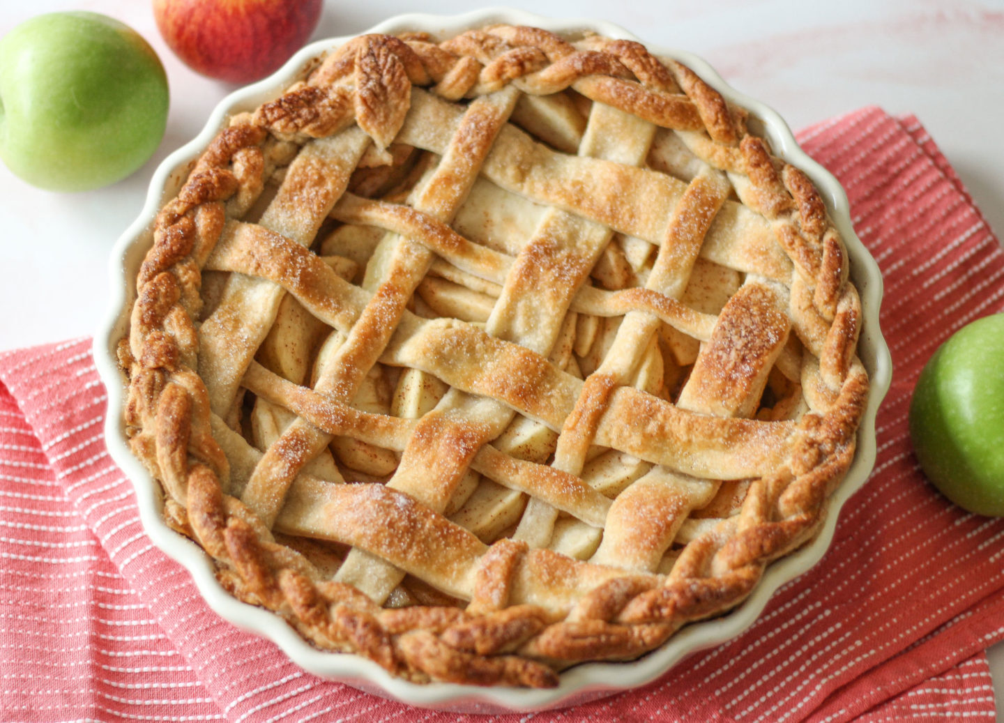view from above of whole uncut lattice apple pie