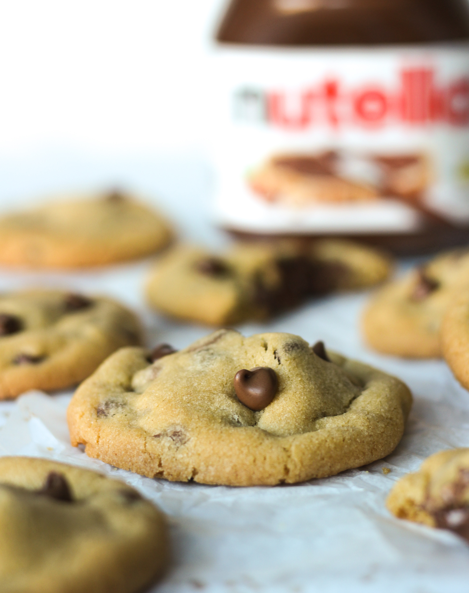 Nutella Stuffed Chocolate Chip Cookies - Baker Jo